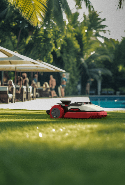 Robotic mower operating autonomously on estate property to demonstrate year-two ROI